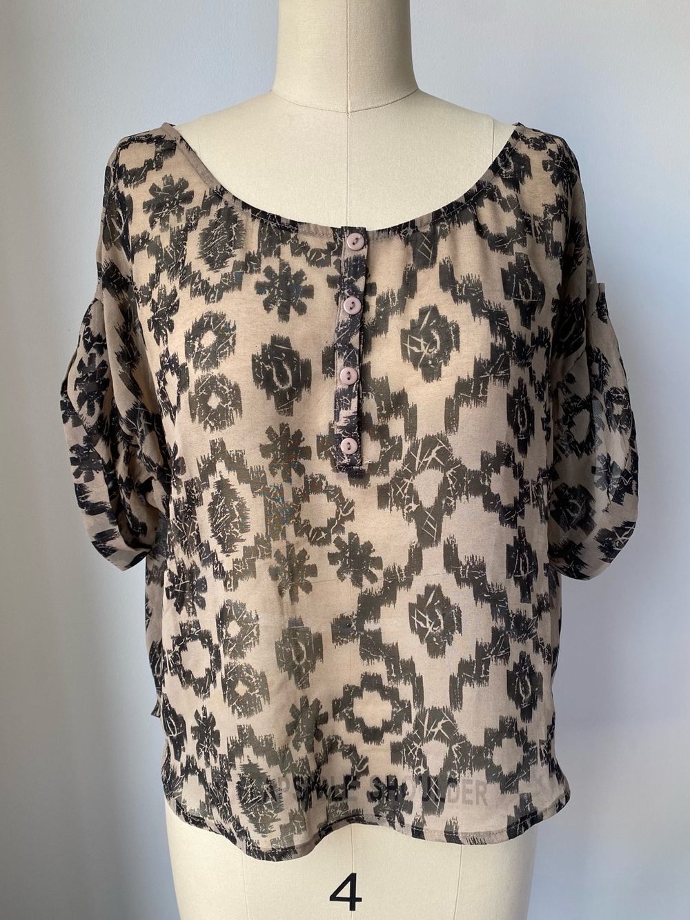imaginary voyage Tan & Black Geometric Ikat Sheer Henley Blouse Top